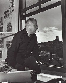 Jacques Prevert sitting at a window Vence 1953